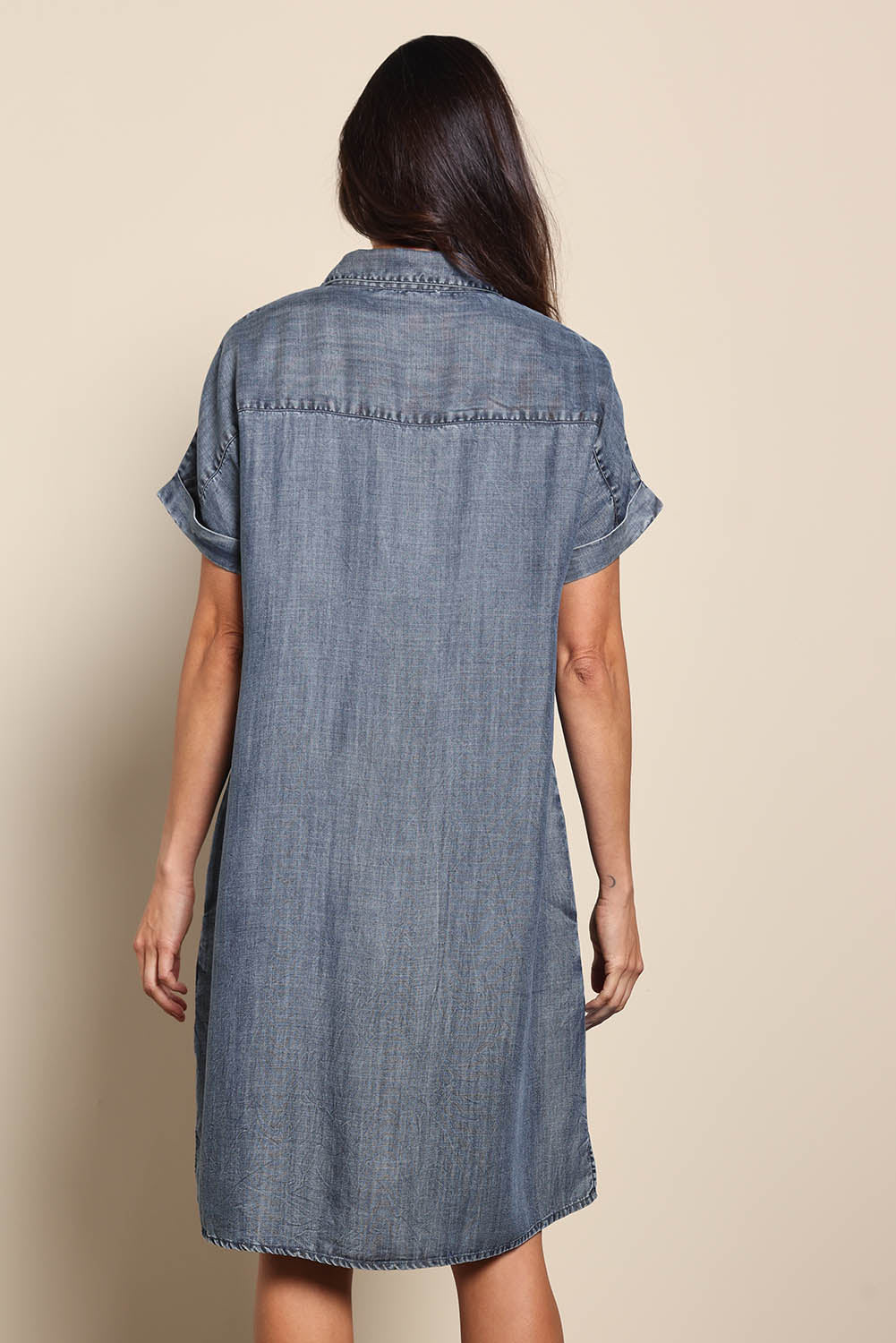 Model Amandam wearing size 10 of the The Luxe Lyocell Shacket Dress – Indigo in colour Indigo, from the back