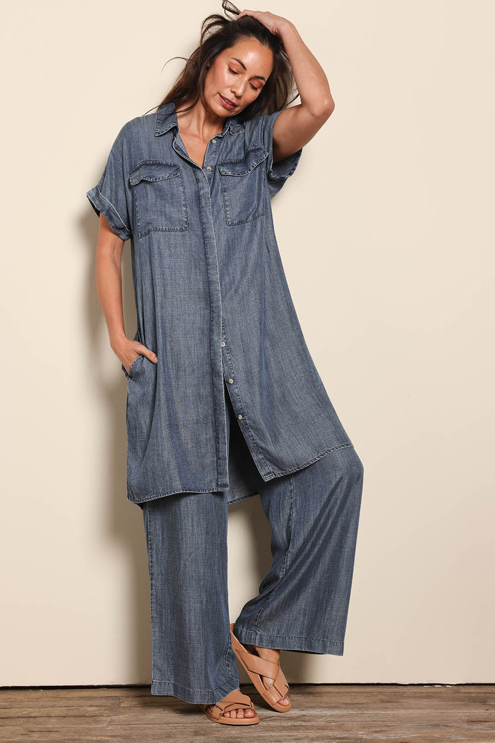 Model Amandam wearing size 10 of the The Luxe Lyocell Shacket Dress – Indigo in colour Indigo, from the front
