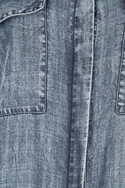 Product shot of the The Luxe Lyocell Shacket Dress – Indigo in colour Indigo, showing detail