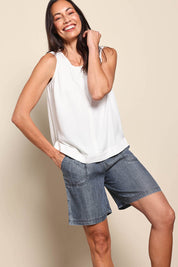 Model Amandam wearing size 10 of the The Luxe Lyocell Pull On Shorts – Indigo in colour Indigo, from an angle