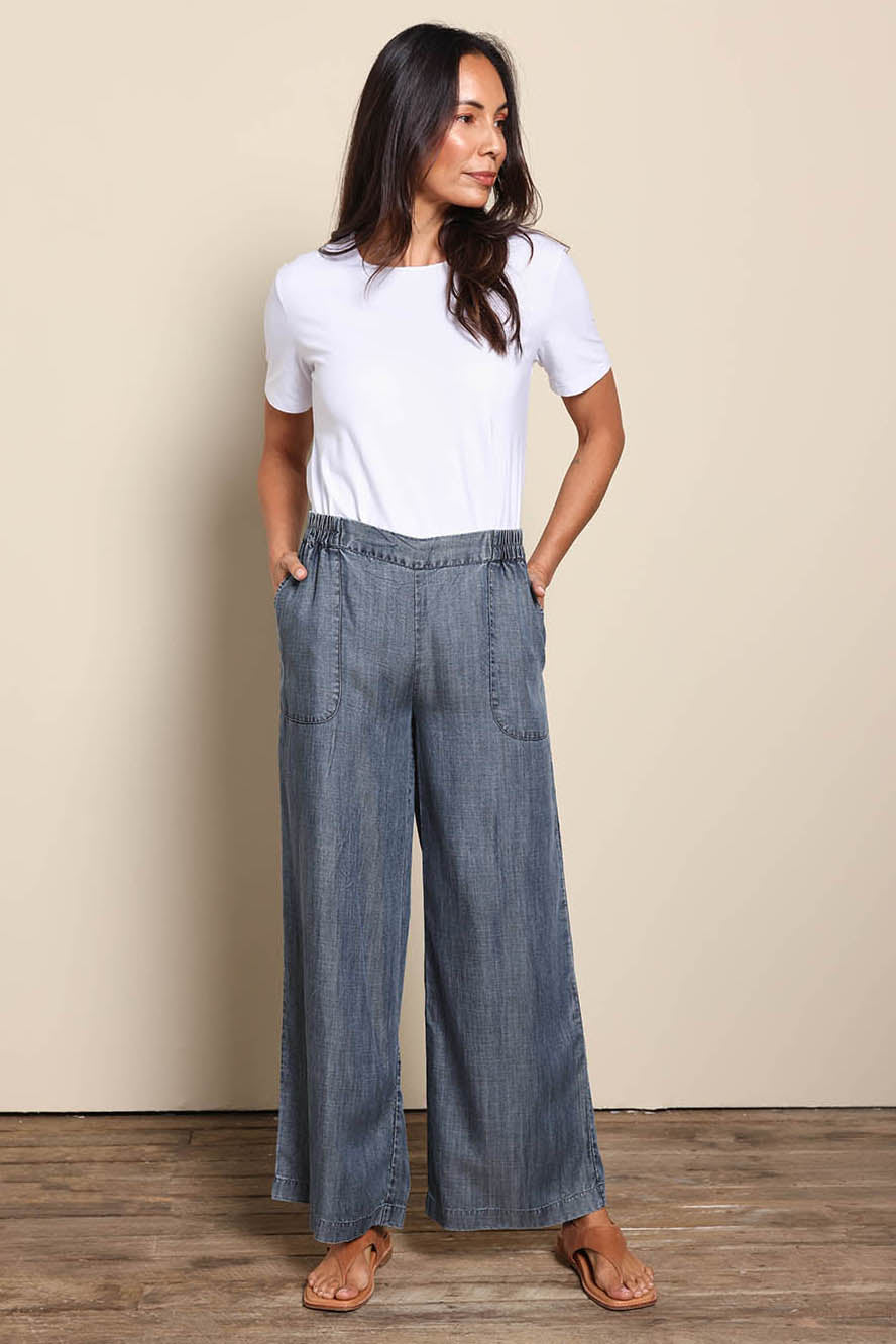 Model Amandam wearing size 10 of the The Luxe Lyocell Pull On Wide Leg Pant – Indigo in colour Indigo, from the front