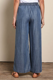Model Amandam wearing size 10 of the The Luxe Lyocell Pull On Wide Leg Pant – Indigo in colour Indigo, from the front