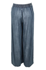 Product shot of the The Luxe Lyocell Pull On Wide Leg Pant – Indigo in colour Indigo, from the back