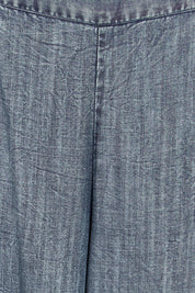 Product shot of the The Luxe Lyocell Pull On Wide Leg Pant – Indigo in colour Indigo, showing detail