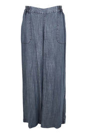 Product shot of the The Luxe Lyocell Pull On Wide Leg Pant – Indigo in colour Indigo, from the front