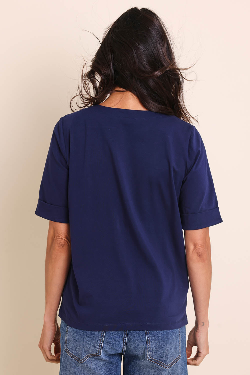 Model Amandam wearing size 10 of the The Keepers Relaxed Fit Tee – Navy in colour Navy, from the back