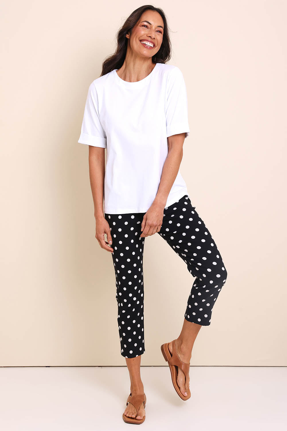 Model Amandam wearing size 10 of the The Keepers Relaxed Fit Tee – White in colour White, from the front