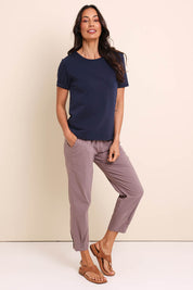 Model Amandam wearing size 10 of the The Lightweight Cotton Blend Pintuck Hem Pant – Coffee in colour Coffee, from the front