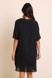 Model Amandam wearing size 10 of the The Summer Cotton Shift Dress With Pockets – Ink in colour Ink, from the back