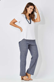 Model Laura wearing size 12 of The Bamboo Tee in colour White (White), from the front, showing the whole outfit