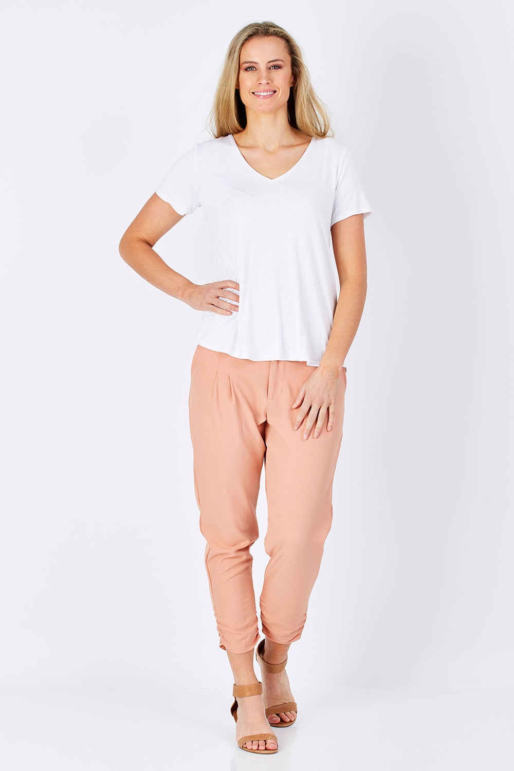 Model Maddy wearing size 10 of The Bamboo Tee in colour White (White), from the front, showing the whole outfit