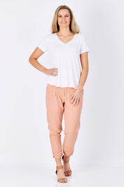 Model Maddy wearing size 10 of The Bamboo Tee in colour White (White), from the front, showing the whole outfit