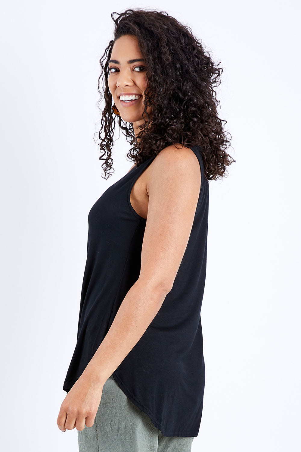 Model Pamela wearing size 10 of The Bamboo Tank in colour Black (Black), from the front, cropped image