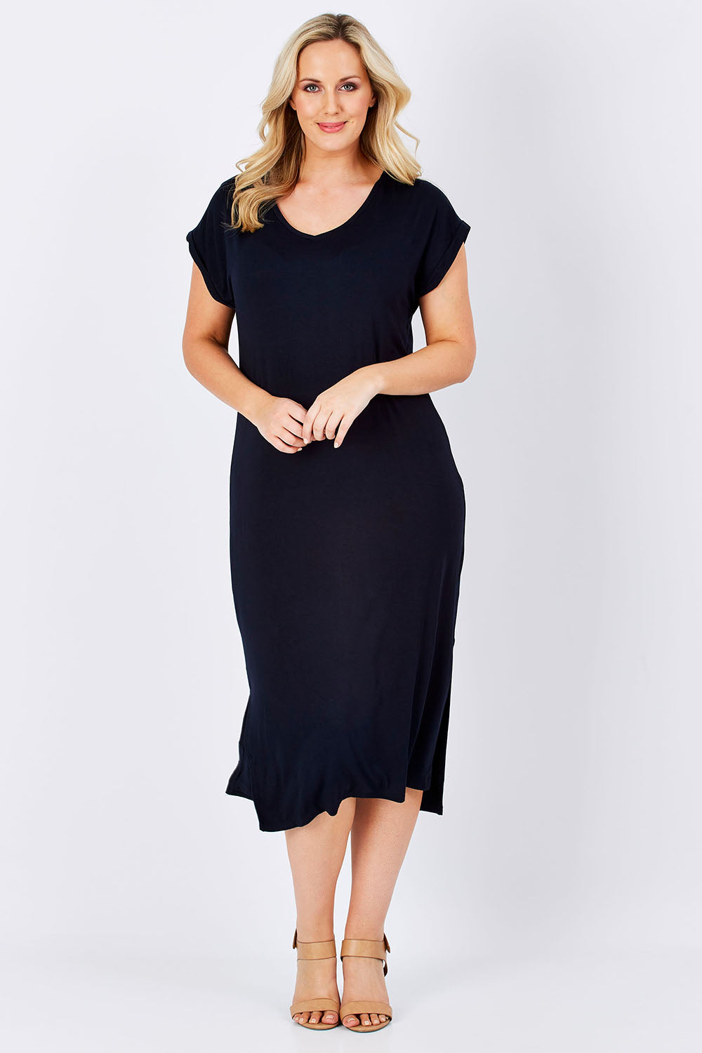 Model Jess wearing size 12 of The Mid Length Tee Dress in colour Navy (Blue), from the front, showing the whole outfit