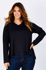 Model Laura wearing size 12 of The V Neck Cotton Tee in colour Black (Black), from the front, cropped image