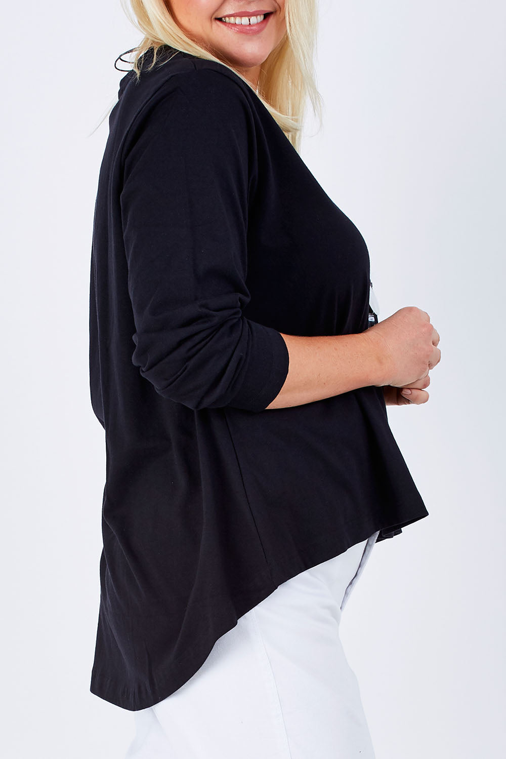 Model Natalie wearing size 16 of The V Neck Cotton Tee in colour Black (Black), from the front, cropped image