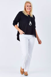 Model Natalie wearing size 16 of The V Neck Cotton Tee in colour Black (Black), from the front, showing the whole outfit