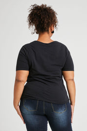 Model Alexis wearing size 16 of The Half Sleeve Tee in colour Black (Black), from the back