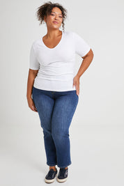 Model Alexis wearing size 16 of The Half Sleeve Tee in colour White (White), from the front, showing the whole outfit