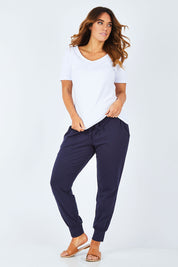 Model Laura wearing size 14 of The Half Sleeve Tee in colour White (White), from the front, showing the whole outfit