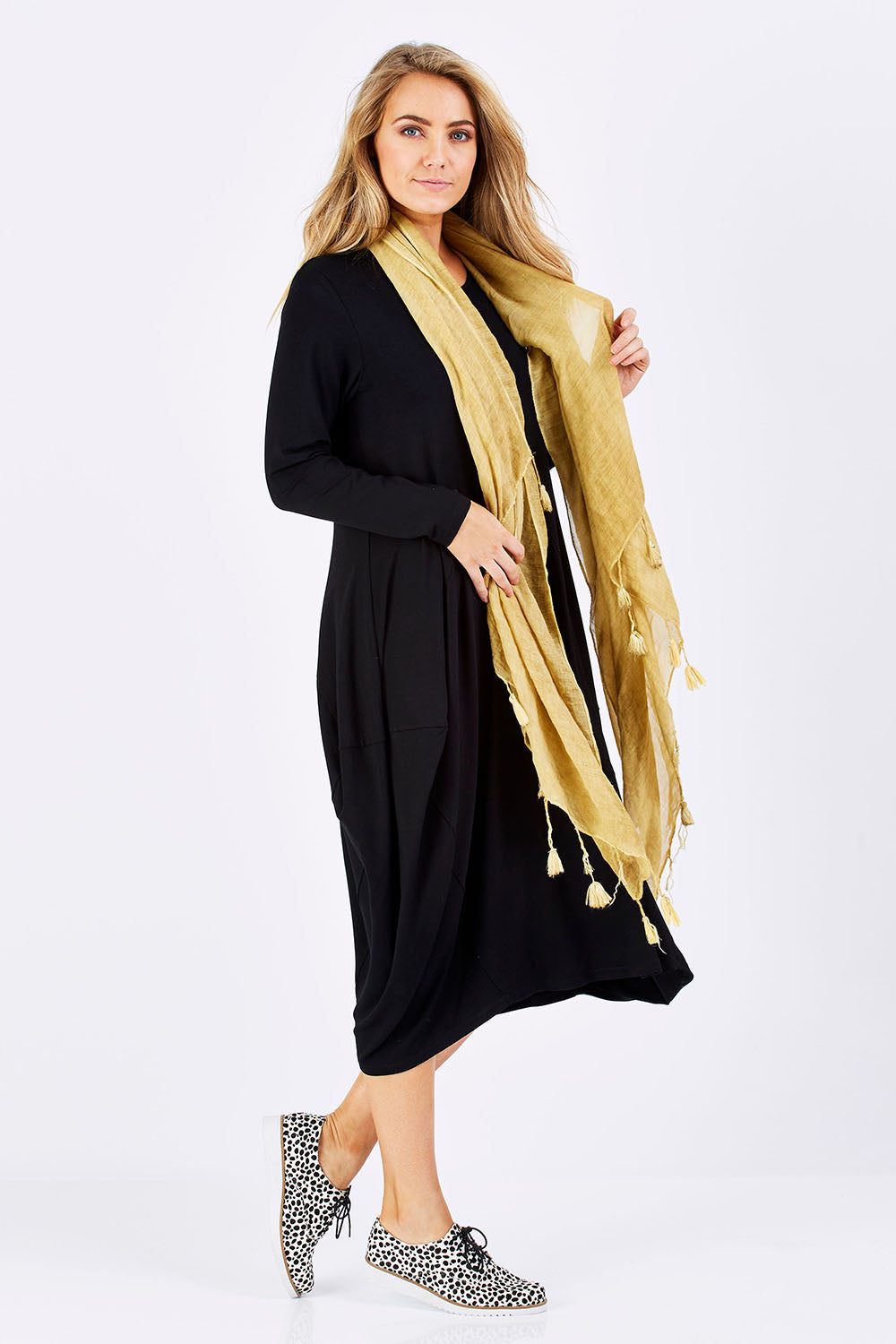 Model Marnee wearing size 10 of The Bounce Dress in colour Black (Black), from the front, showing the whole outfit