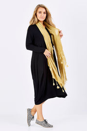 Model Marnee wearing size 10 of The Bounce Dress in colour Black (Black), from the front, showing the whole outfit