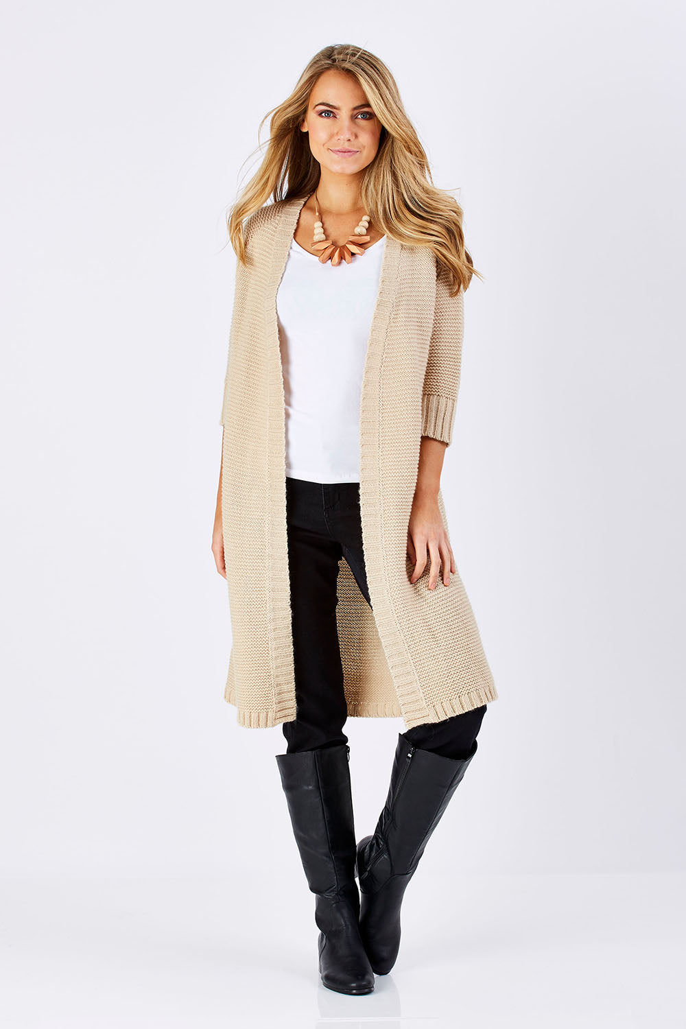 Model Marnee wearing size S of The Half Sleeve Cardigan in colour Oatmeal, from the front, showing the whole outfit