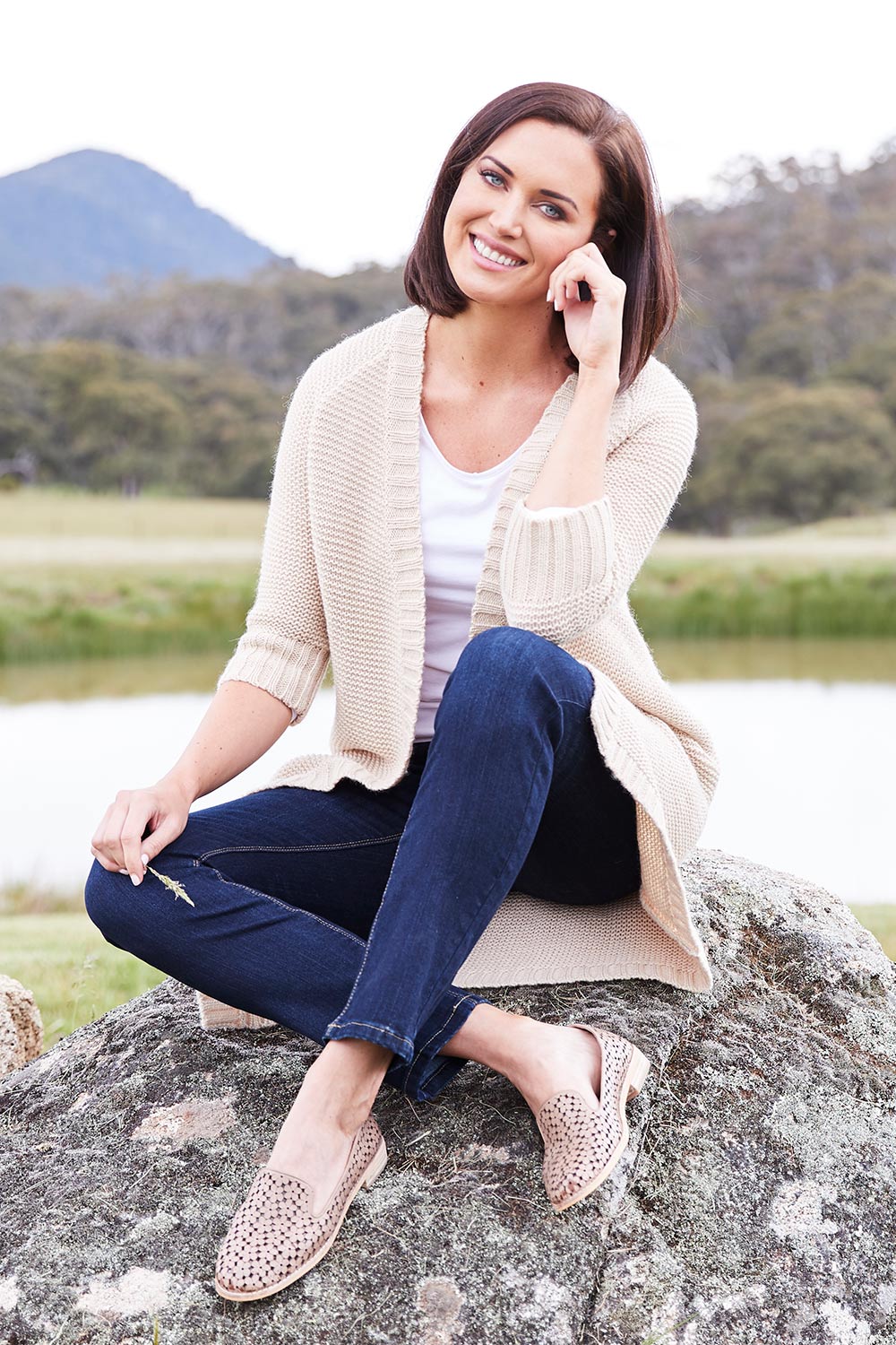 Model Perrie wearing size S of The Half Sleeve Cardigan in colour Oatmeal, from the front, showing the whole outfit