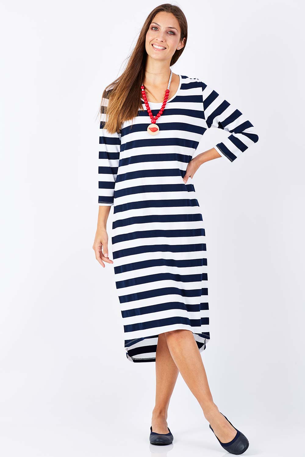 Model Anna wearing size 10 of The High Low Midi Dress in colour NavyWhite (Blue), from the front, showing the whole outfit