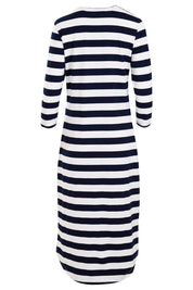 Product shot of The High Low Midi Dress in colour NavyWhite (Blue), from the back