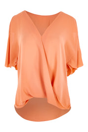 Product shot of The Cut Out Shoulder Blouse in colour Clay, from the front