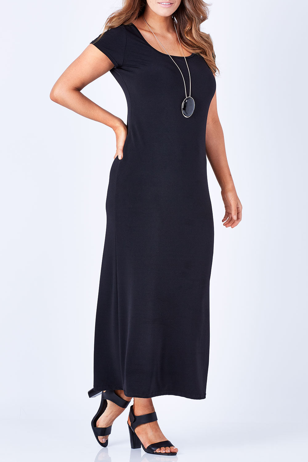 Model Laura wearing size 12 of The Cap Sleeve Maxi Dress in colour Black (Black), from the front, cropped image