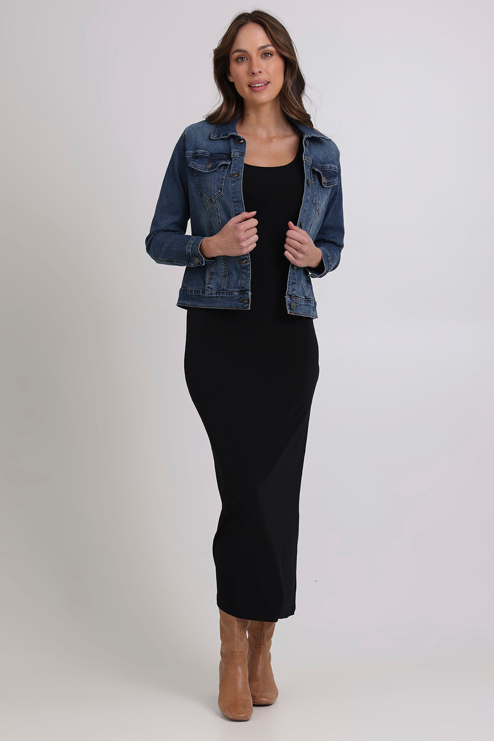 Model Madeline wearing size 10 of The Cap Sleeve Maxi Dress in colour Black (Black), from the front, showing the whole outfit
