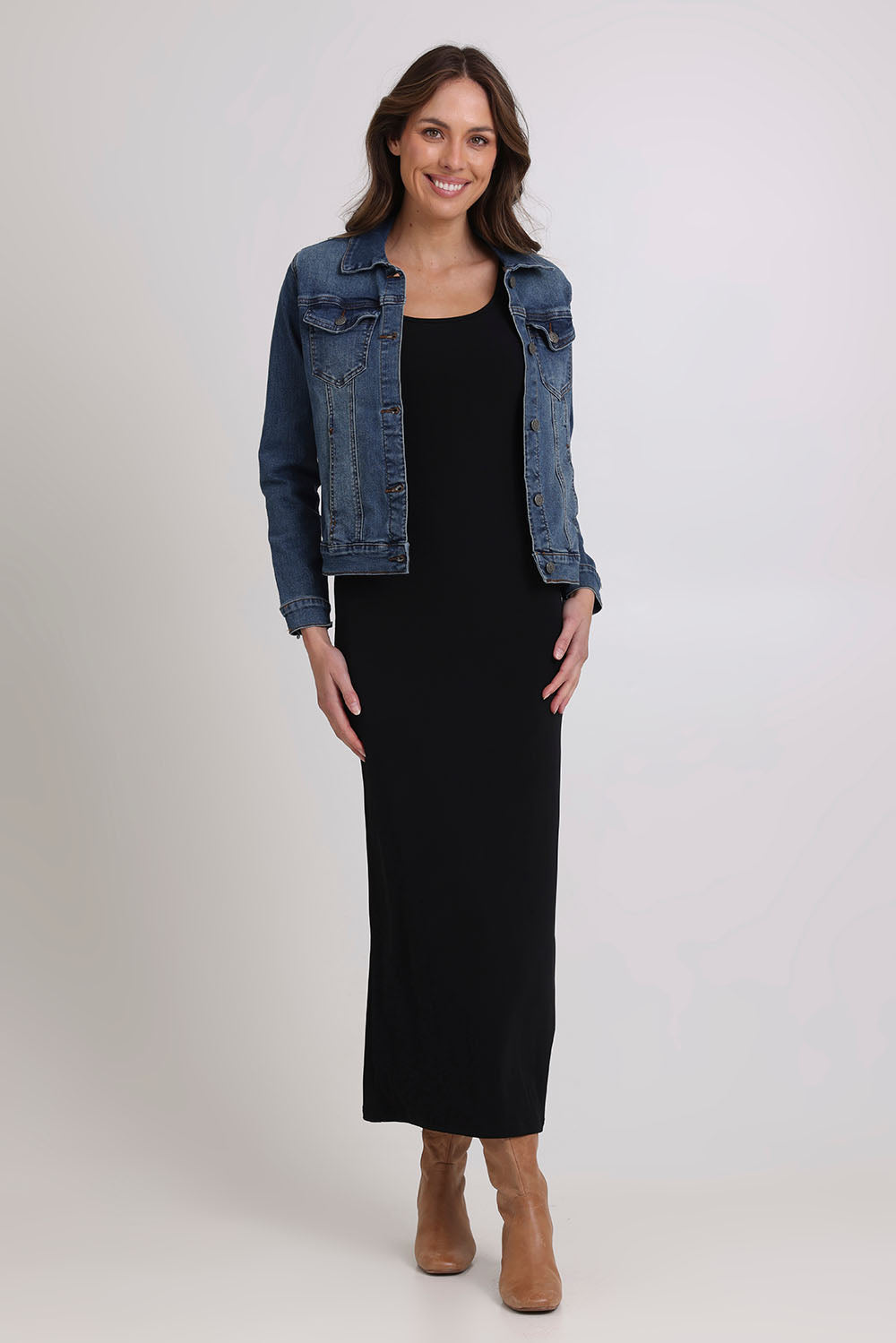 Model Madeline wearing size 10 of The Cap Sleeve Maxi Dress in colour Black (Black), from the front, showing the whole outfit
