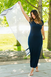Model Laura wearing size 14 of The Cap Sleeve Maxi Dress in colour Navy (Blue), from the front, showing the whole outfit