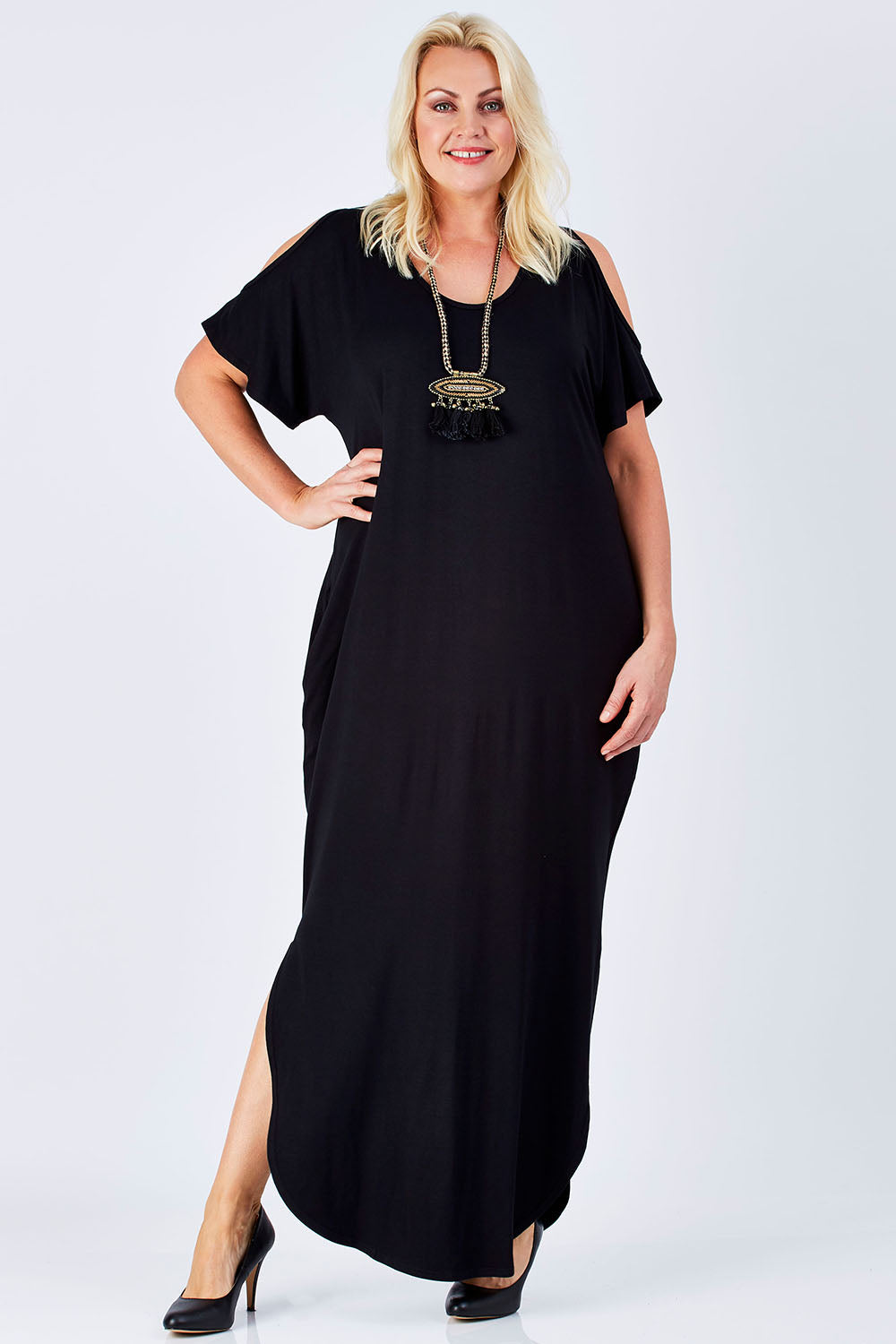 Model Natalie wearing size 16 of The Shoulder Splice Maxi Dress in colour Black (Black), from the front, showing the whole outfit