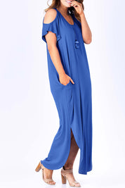 Model Laura wearing size 12 of The Shoulder Splice Maxi Dress in colour Splash (Blue), from the front, cropped image