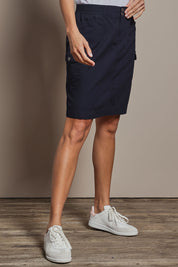 Model Amanda wearing size 10 of The Cotton Cargo Skirt in colour Navy (Blue), from the front, cropped image