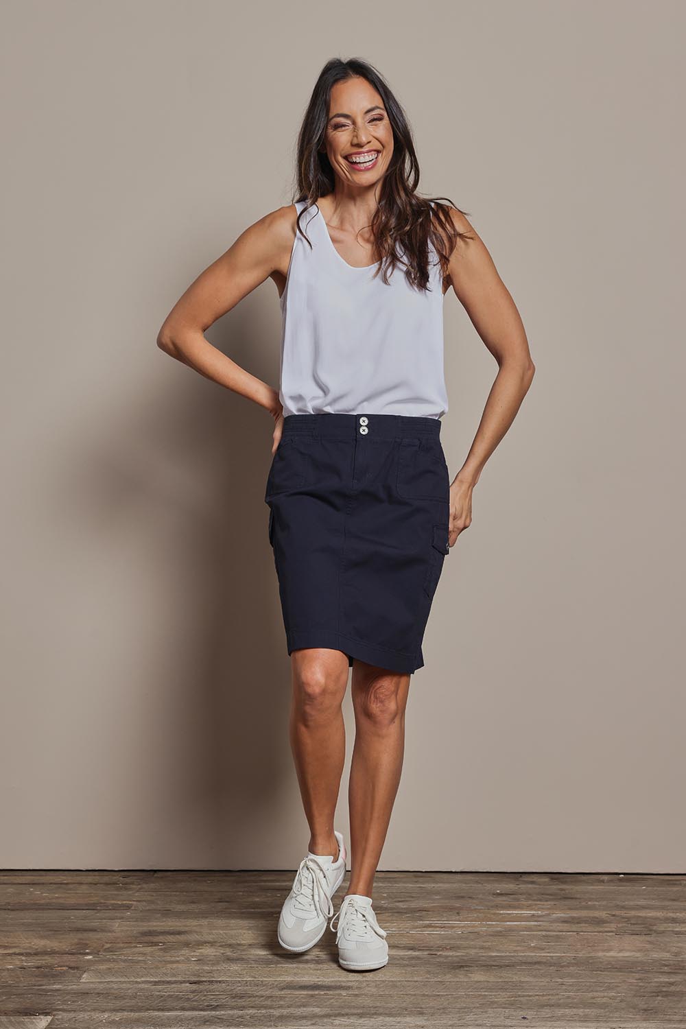 Model Amanda wearing size 10 of The Cotton Cargo Skirt in colour Navy (Blue), from the front, showing the whole outfit