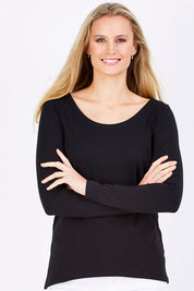 Model Maddy wearing size 10 of The Relaxed Long Sleeve Tee in colour Black (Black), from the front, cropped image
