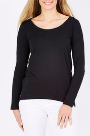 Model Maddy wearing size 10 of The Relaxed Long Sleeve Tee in colour Black (Black), from the front, cropped image