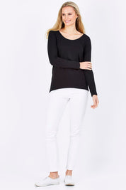 Model Maddy wearing size 10 of The Relaxed Long Sleeve Tee in colour Black (Black), from the front, showing the whole outfit