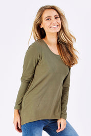 Model Marnee wearing size 10 of The Relaxed Long Sleeve Tee in colour Khaki (Green), from the front, cropped image