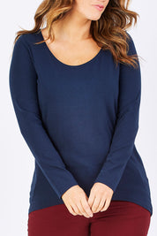 Model Laura wearing size 12 of The Relaxed Long Sleeve Tee in colour Navy (Black), from the front, cropped image