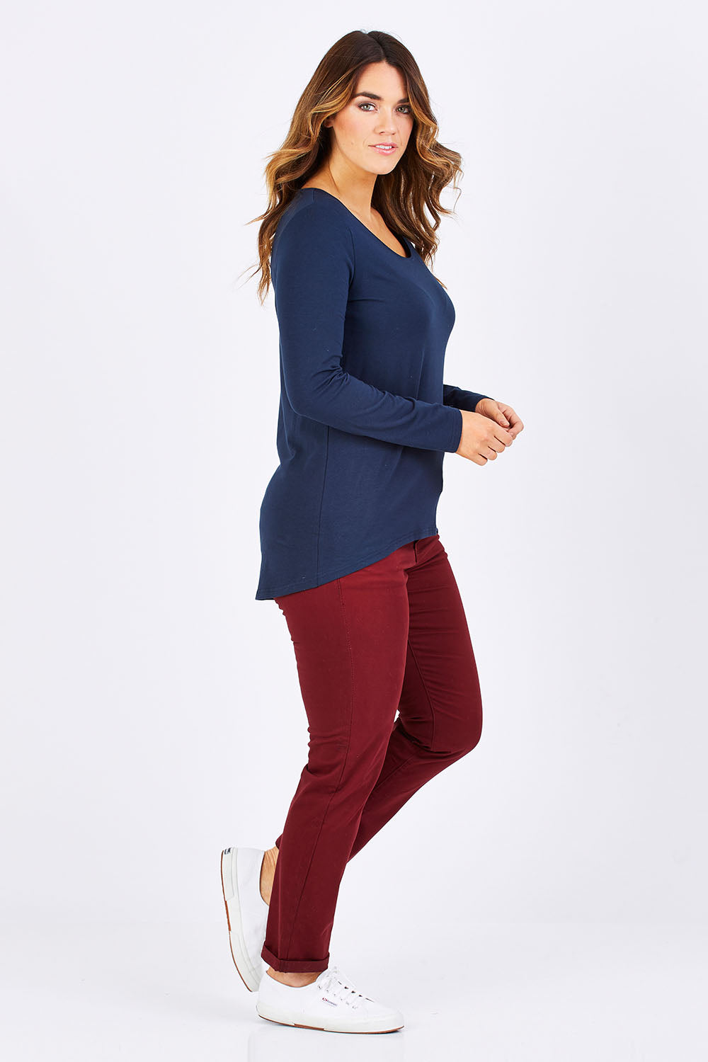 Model Laura wearing size 12 of The Relaxed Long Sleeve Tee in colour Navy (Black), from the front, showing the whole outfit