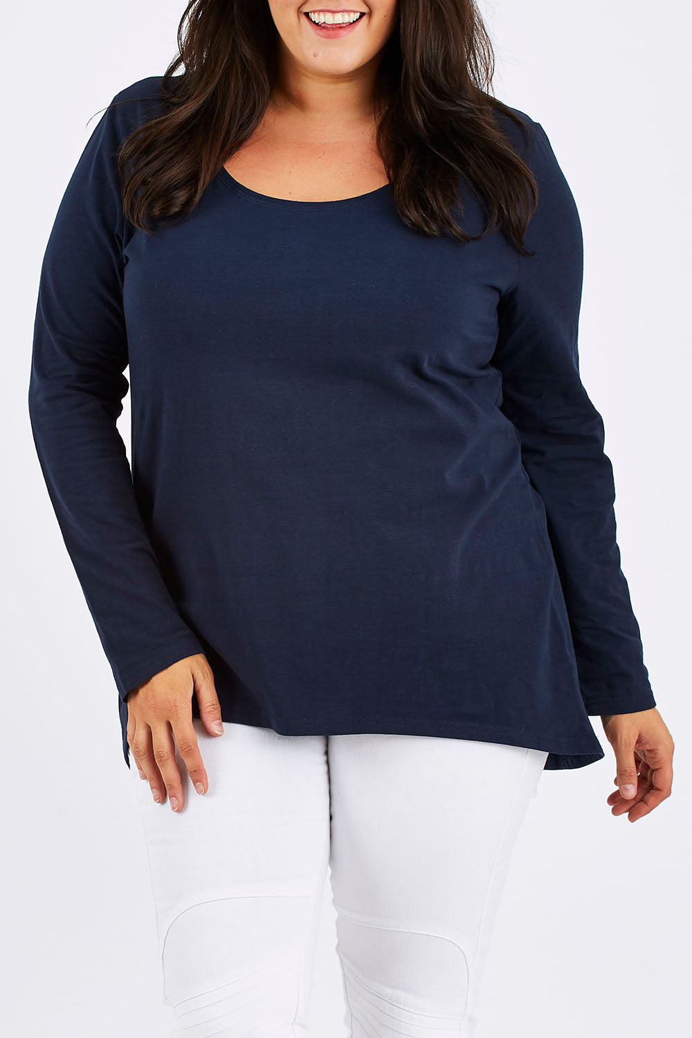 Model Mae wearing size 18 of The Relaxed Long Sleeve Tee in colour Navy (Black), from the front, cropped image