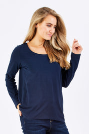 Model Marnee wearing size 10 of The Relaxed Long Sleeve Tee in colour Navy (Black), from the front, cropped image