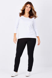 Model Laura wearing size 12 of The Relaxed Long Sleeve Tee in colour White (White), from the front, showing the whole outfit