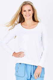 Model Maddy wearing size 10 of The Relaxed Long Sleeve Tee in colour White (White), from the front, cropped image