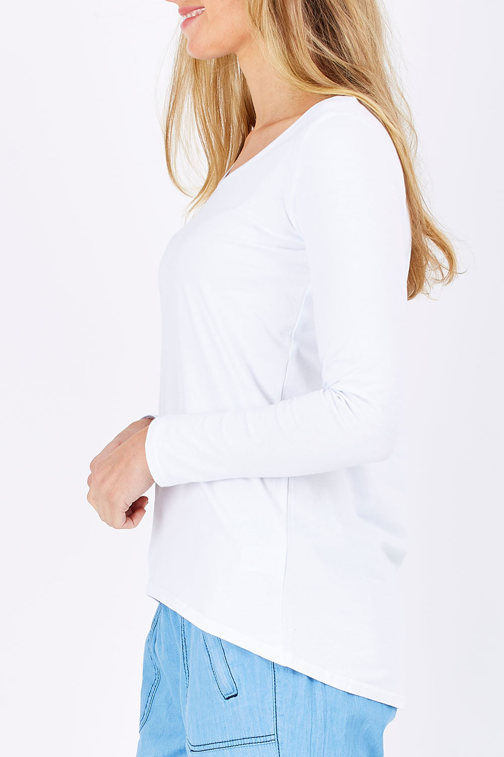 Model Maddy wearing size 10 of The Relaxed Long Sleeve Tee in colour White (White)